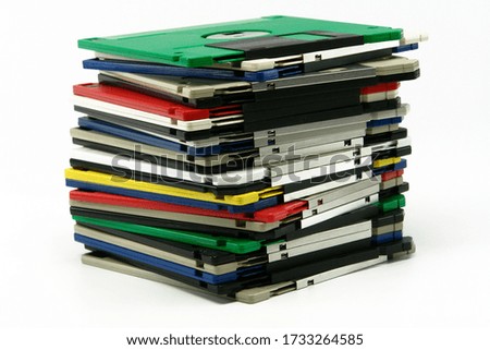 Stack of vintage floppy drives (Isolated on white background)