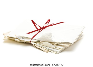 Stack Of Vintage Love Letters Over White Background
