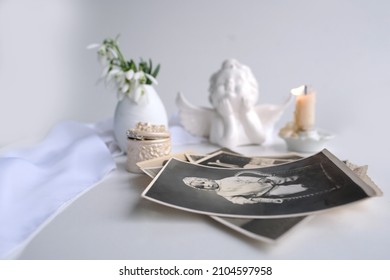 Stack Of Vintage Photos, Baby Photography Of 1960, Candle Is Lit, First Spring Flowers, Snowdrop, Galanthus In Vase, Concept Of Family Tree, Genealogy, Childhood Memories