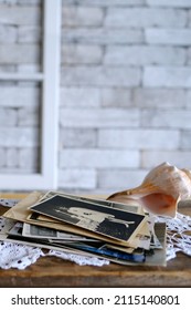 Stack Of Vintage Photos, Old Photography Of 1940-1950 On Wooden Table, Concept Of Genealogy, The Memory Of Ancestors, Family Tree, Genealogy, Childhood Memories, Family Archive