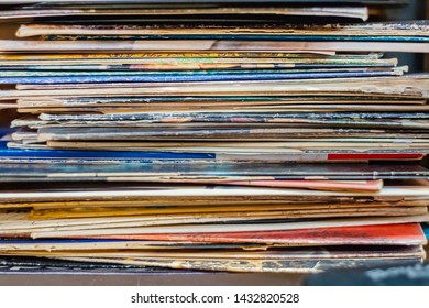 A Stack Of Vinyl Records, Albums Without Any Specific Band Or Brand Listed — Colorful, Stacked Horizontal Lines Of Album Covers Located At The Arc In New Iberia, Louisiana. 