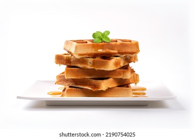 Stack Of Waffles With Honey And Mint On White Plate On White Background.