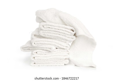 stack of white beach soft towels folded on white background