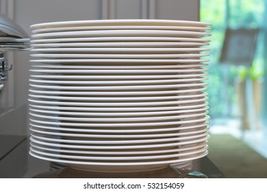 Stack of white ceramics plate
