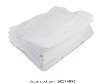 Stack of white folded t-shirts isolated on white background - close up. Clipping path with t-shirt shape and shadow for retouching. Ready for add small graphic on for showing and presentation.