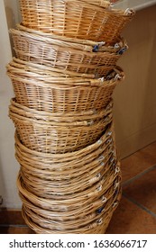 Stack of wicker baskets for shopping in a organic grocery store