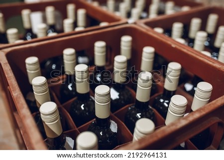 Stack of wine bottles in cellar