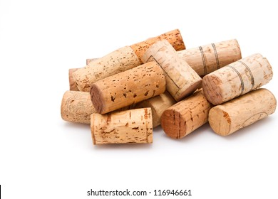 Stack of wine corks on white background