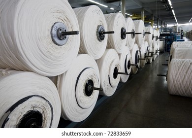 Stack Of Yarn Spools In A Textile Mill.