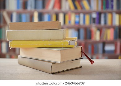 Stack of yellow books on the table