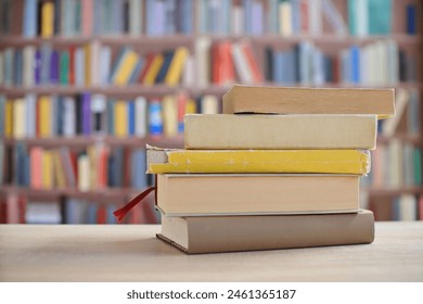 Stack of yellow books on the table