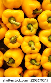 Stack Of Yellow Capsicum Background 