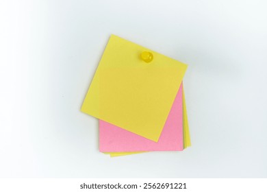 A stack of yellow and pink sticky notes pinned together, perfect for organization or reminders. The vibrant colors add a touch of creativity to office or study spaces.