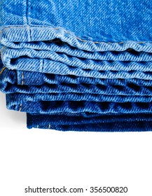 stacked blue jeans