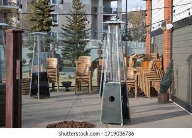 Stacked Chairs And Tables In Outside Patio - Resturant Closed Due To Covid- 19