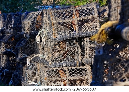 Stacked crab and lobster pots in Ilfracombe, North Devon
