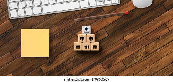 Stacked Cubes With Message TEAM And Team Icons With Office Items On Wooden Background