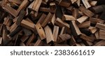 stacked dry firewood as a background