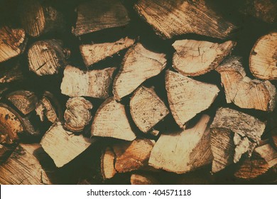 Stacked firewood. Background of stacked firewood