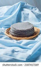 Stacked Mexican Blue Tortillas, Made With Blue Corn.