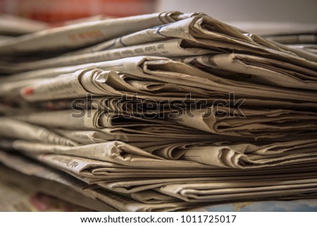 Stacked old newspaper on the table