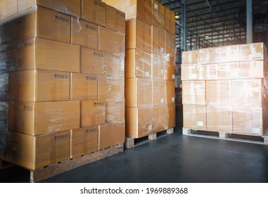 Stacked of Package Boxes on Wooden Pallet at Storage Warehouse. Shipment Boxes. Cargo Export- Import.	 - Shutterstock ID 1969889368