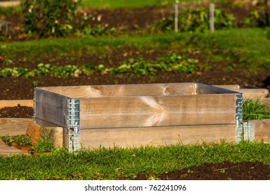 Stacked Pallet Collars In Garden