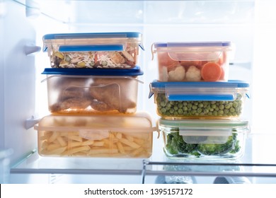 Stacked Of Plastic Containers With Various Food Store In Refrigerator