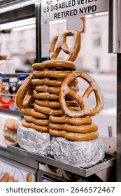 Stacked pretzels create an eye-catching display at a street vendor in New York City