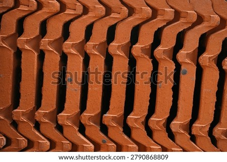 stacked red clay rooftiles for texture and background                                