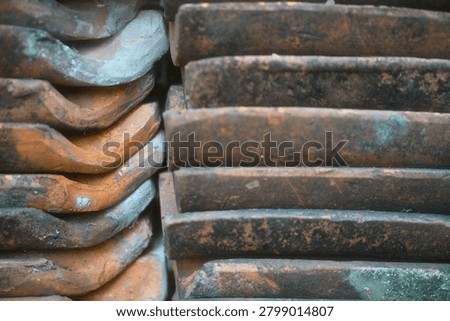 stacked red clay rooftiles for texture and background                                 