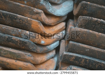 stacked red clay rooftiles for texture and background                                