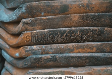 stacked red clay rooftiles for texture and background                                 