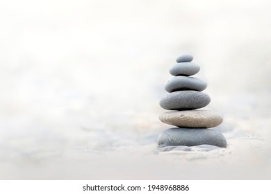 Stacked Rocks Or Cairns On Beach