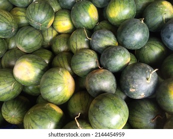 stacked seedless red green watermelon