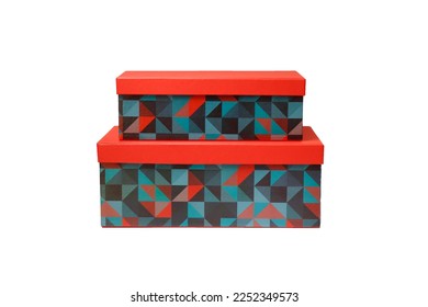 Stacked set of two rectangular gift boxes with vibrant red lids and colorful geometric triangle pattern, isolated on white background. Blank cardboard packaging mockup.