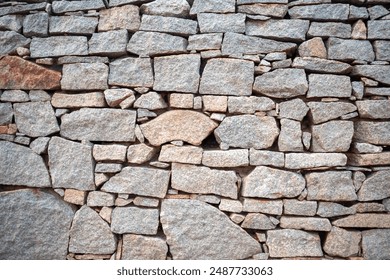 Stacked stone brick wall. Stone cladding wall made of striped stacked slabs of natural grey rocks. Panels for exterior. pattern of decorative slate stone wall surface. Stone cladding wallpaper.  - Powered by Shutterstock