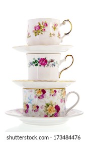 Stacked Vintage Coffee Or Tea Cups Isolated Over White Background