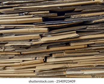 stacked waste paper collected for recycling. Stacked Cardboard Recycling Boxes In A Pile. Texture of stacked carton - Powered by Shutterstock