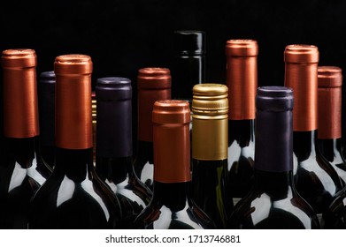 Stacked Wine Bottle Background Isolated On Black Background