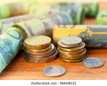 Stacking of Australia coins for saving money concept