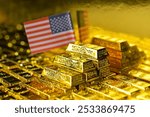 Stacking gold bars with USA flag. Gold is hard commodity goods, risk asset, tangible value that used to be gold reserve, save assets during war and economic crisis.