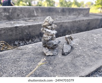 Stacking Small Stone Rocks Up Together 