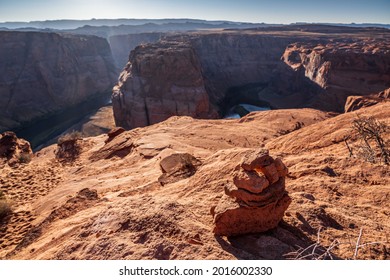 Stacking Stones in Horseshoe Bend at Page, Arizona - Powered by Shutterstock