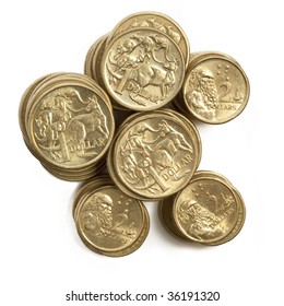 Stacks of Australian one dollar and two dollar coins, isolated on white.