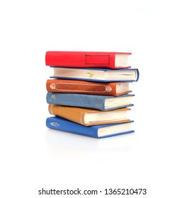 Stacks of books isolated on white background - Shutterstock ID 1365210473