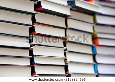 Stacks of books, selective focus. Background for literature, bookstore, library