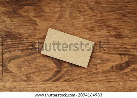 Stacks of businesscards with copy space on wooden background