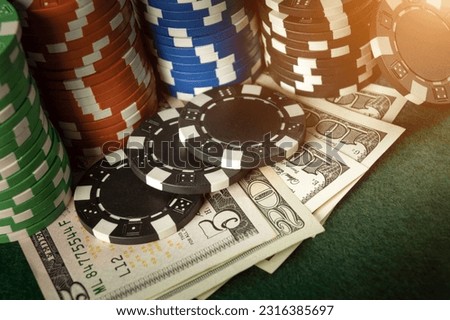 Stacks of chips on the money received as a result of winning the game of poker. Fortune or luck depends on the bet and the combination