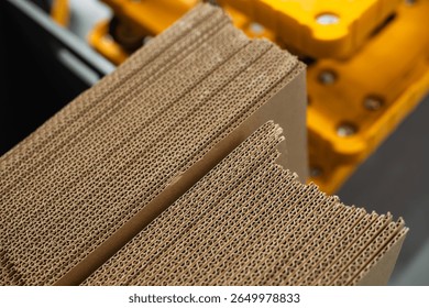 stacks of containerboard sheets in warehouse facility
